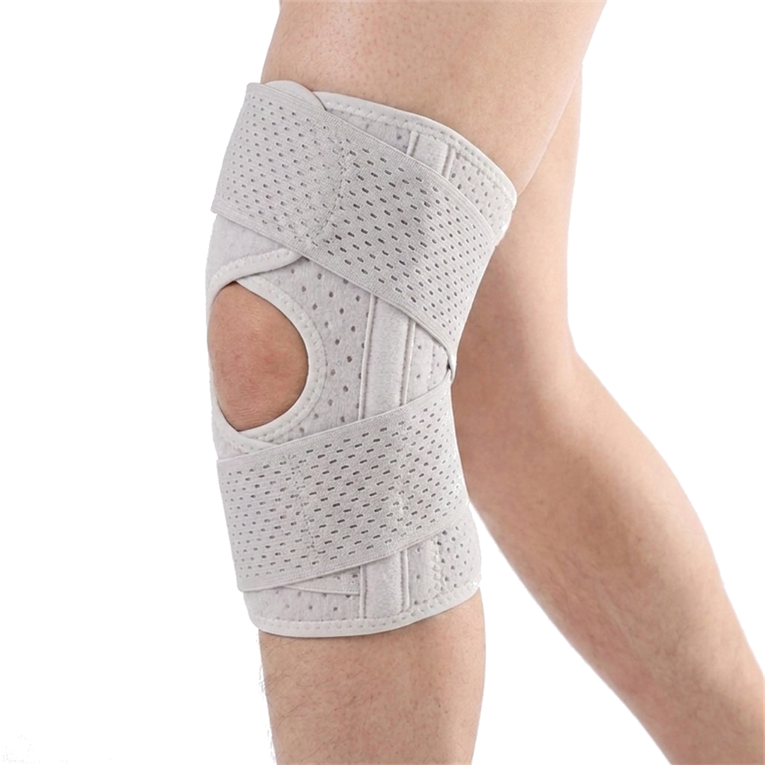 Cycling sports knee pad in white on the right knee, open patella wrap
