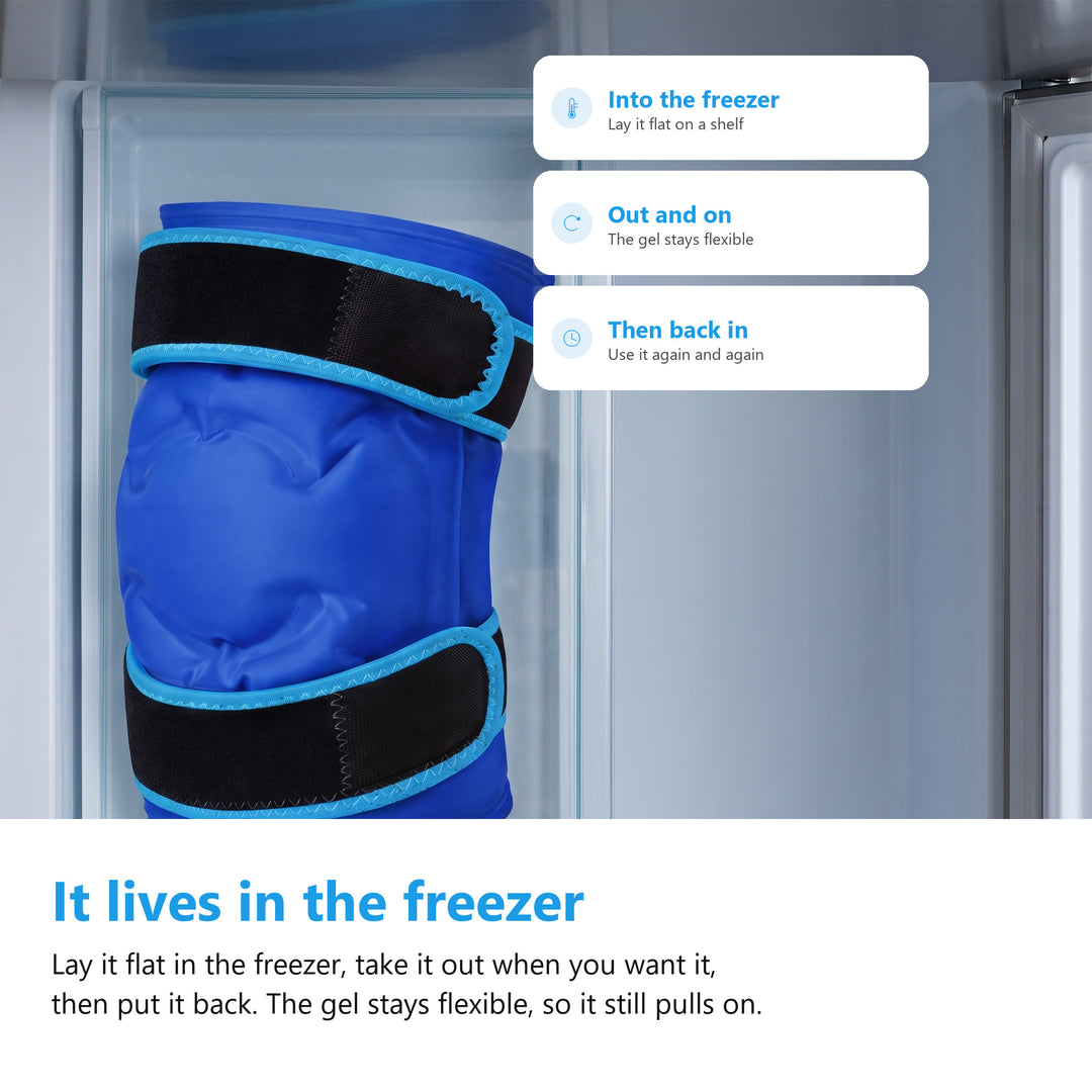 Blue knee ice pack gel sleeve lying flat on a shelf inside an open freezer drawer