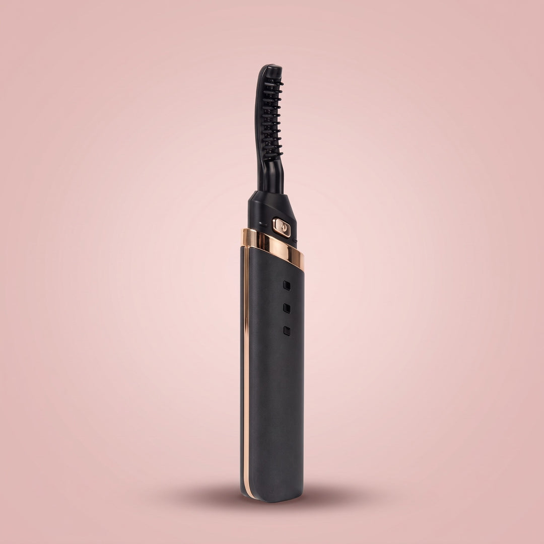Black rechargeable heated eyelash curler with a curved comb head