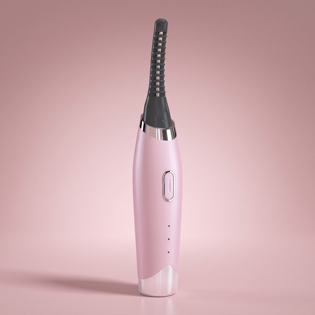 Pink rechargeable heated eyelash curler with a curved comb head