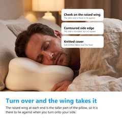 Man asleep on his side with his cheek against the raised end wing of the contoured memory foam pillow