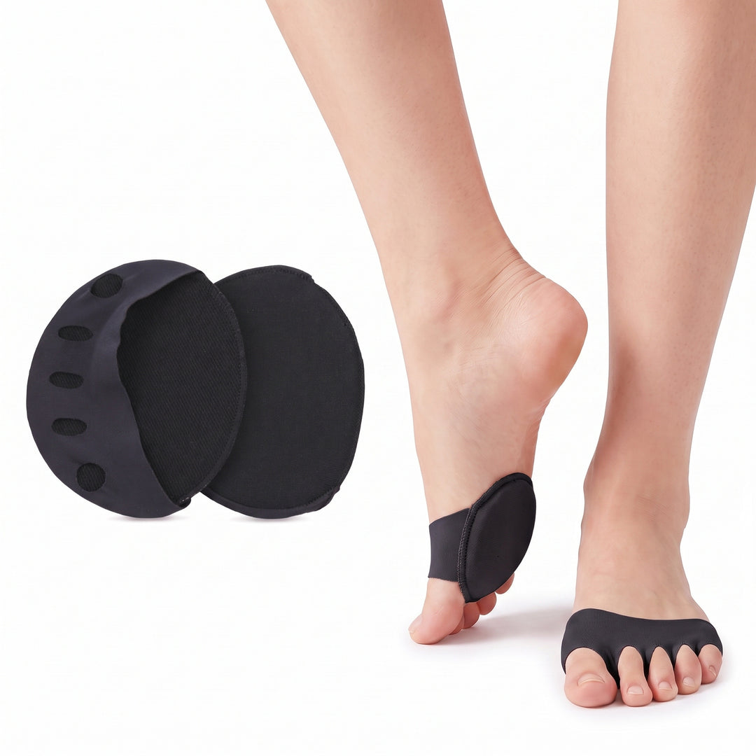 Black forefoot metatarsal pads worn on the ball of the foot with all five toes through the five oval toe holes, shown beside the pair of pads