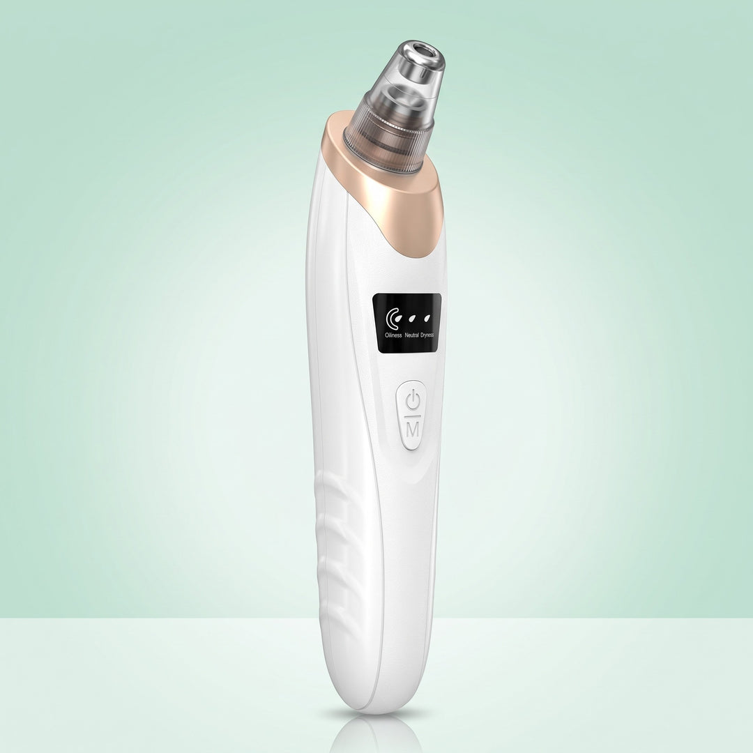 White pore vacuum blackhead remover with a suction head fitted and the skin-type display lit