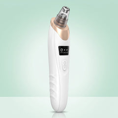 White pore vacuum blackhead remover with a suction head fitted and the skin-type display lit