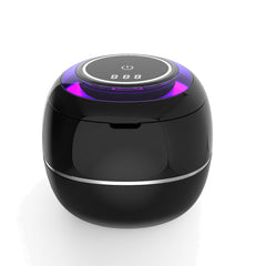 Ultrasonic retainer cleaner in black on a white background, lid closed with the digital display lit