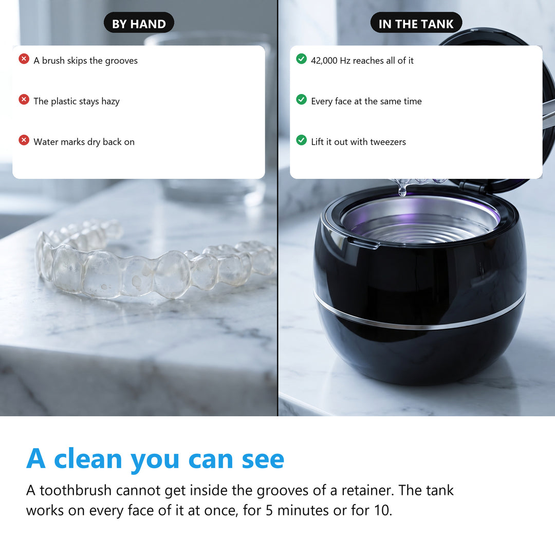 A cloudy retainer cleaned by hand next to a clear retainer lifted out of the ultrasonic cleaner with tweezers