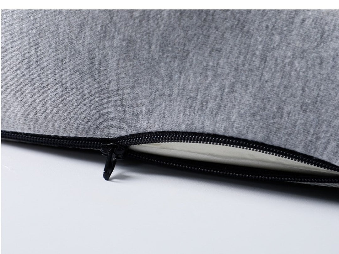 The full length zip along the back edge of the removable cover
