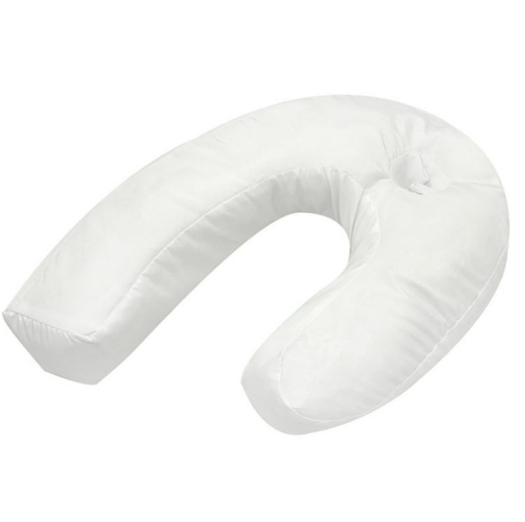 White U shaped side sleeping pillow seen from the side