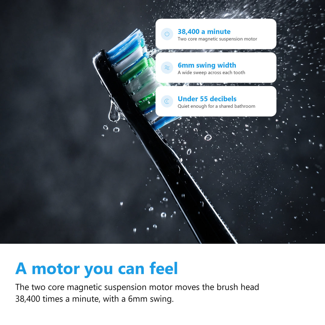 Macro of the sonic toothbrush bristle head vibrating with water droplets, showing the magnetic suspension motor power
