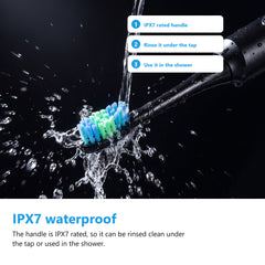 IPX7 waterproof electric toothbrush being rinsed under running water