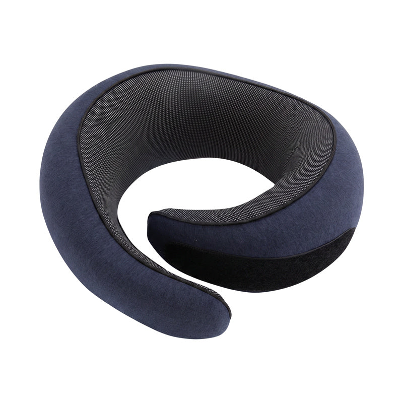Memory foam travel neck pillow in navy, coiled, with black mesh lining