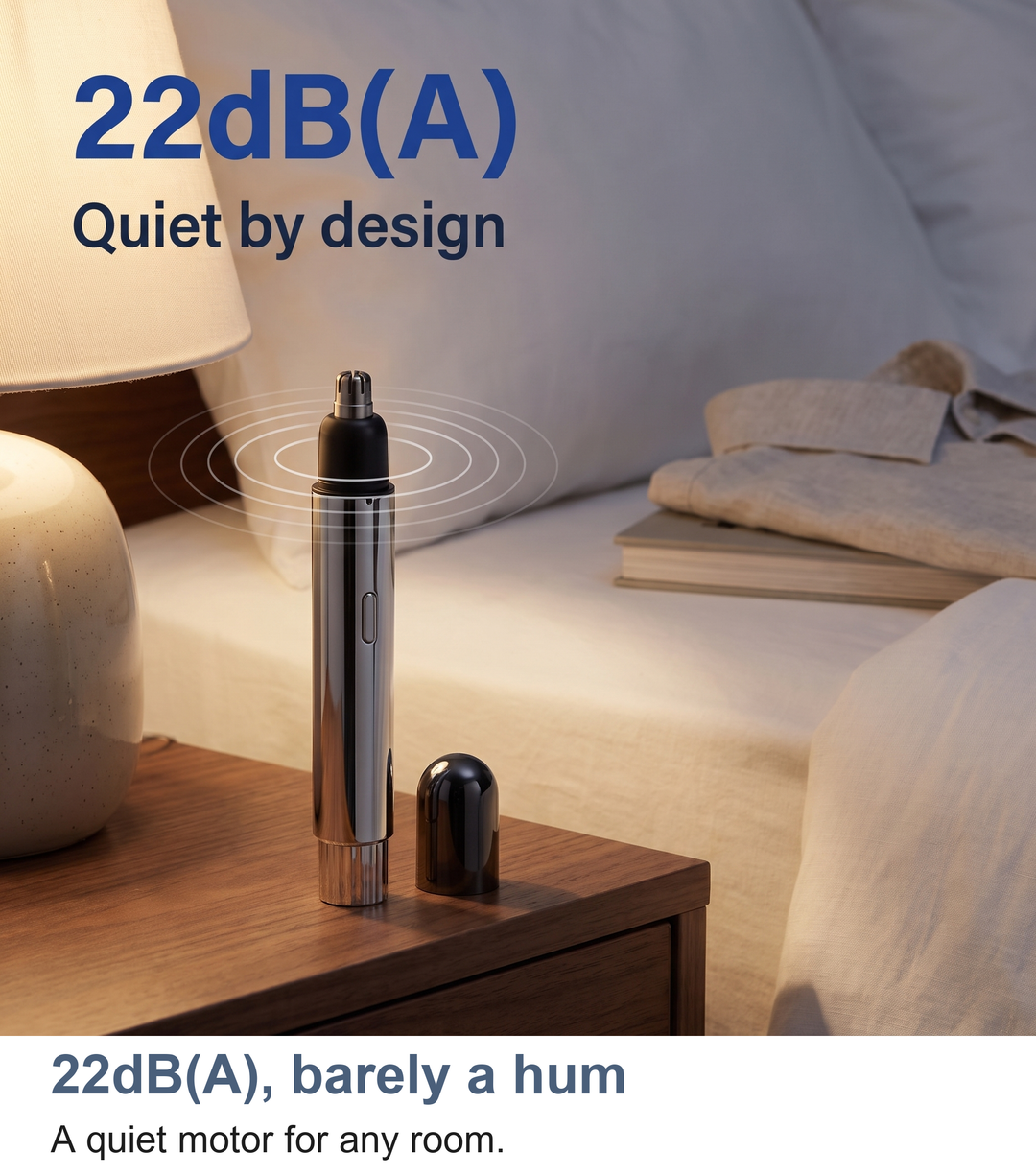 Nose hair trimmer beside a bed at night showing its quiet 22dB(A) motor