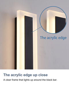 The acrylic edge up close: A clear frame that lights up around the black bar.