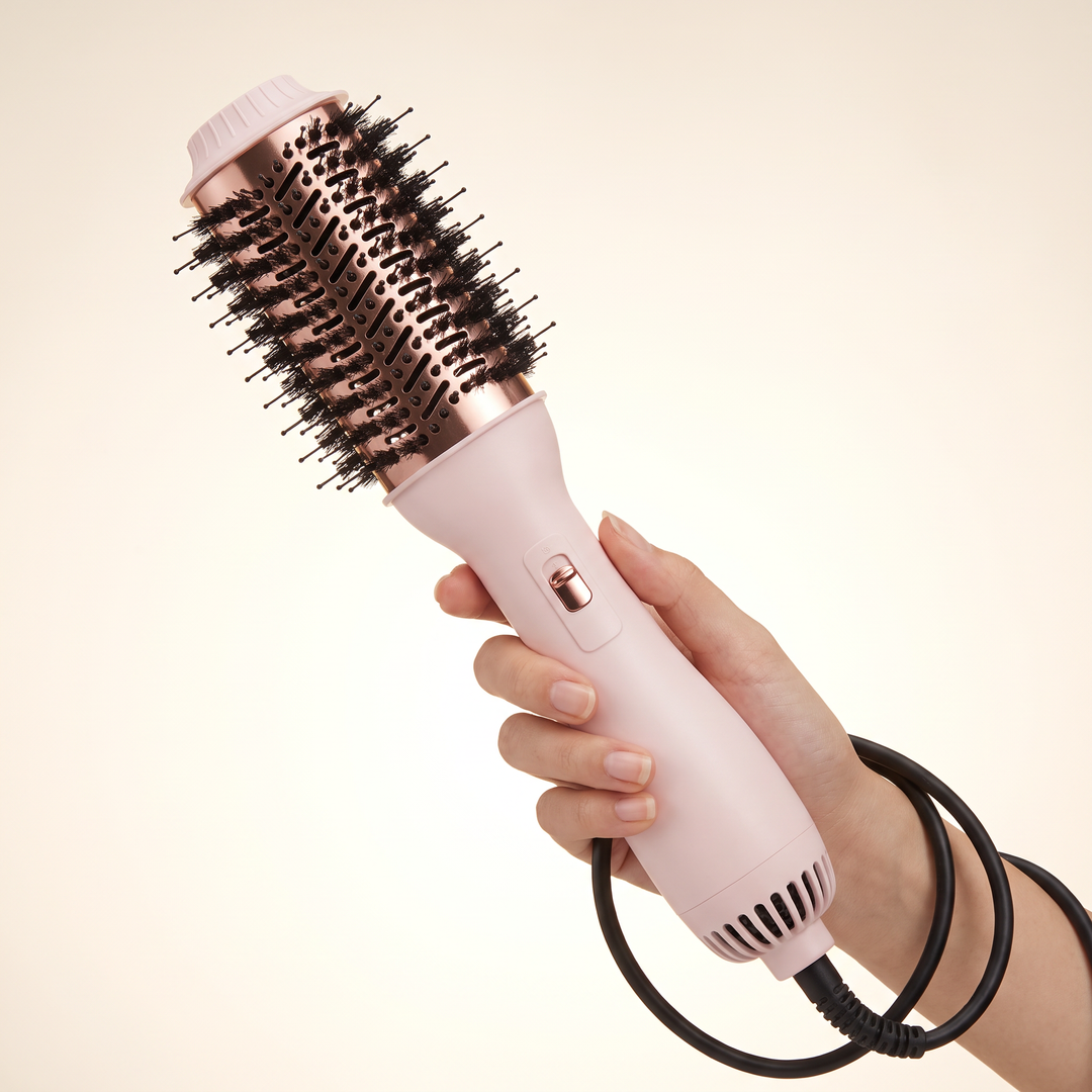 One-step hot air styling brush, pink and gold, oval barrel