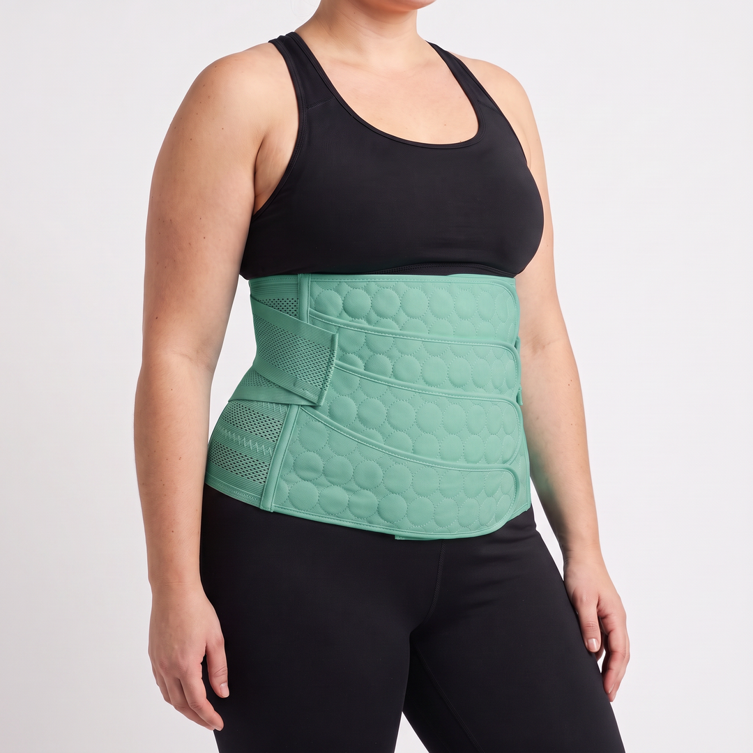 Postpartum belly band abdominal binder in Mint Green worn on the waist
