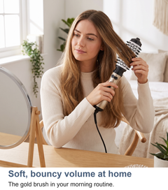 Gold rotating hot air brush as part of a morning styling routine