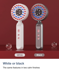 The electric scalp massager in white and in black side by side