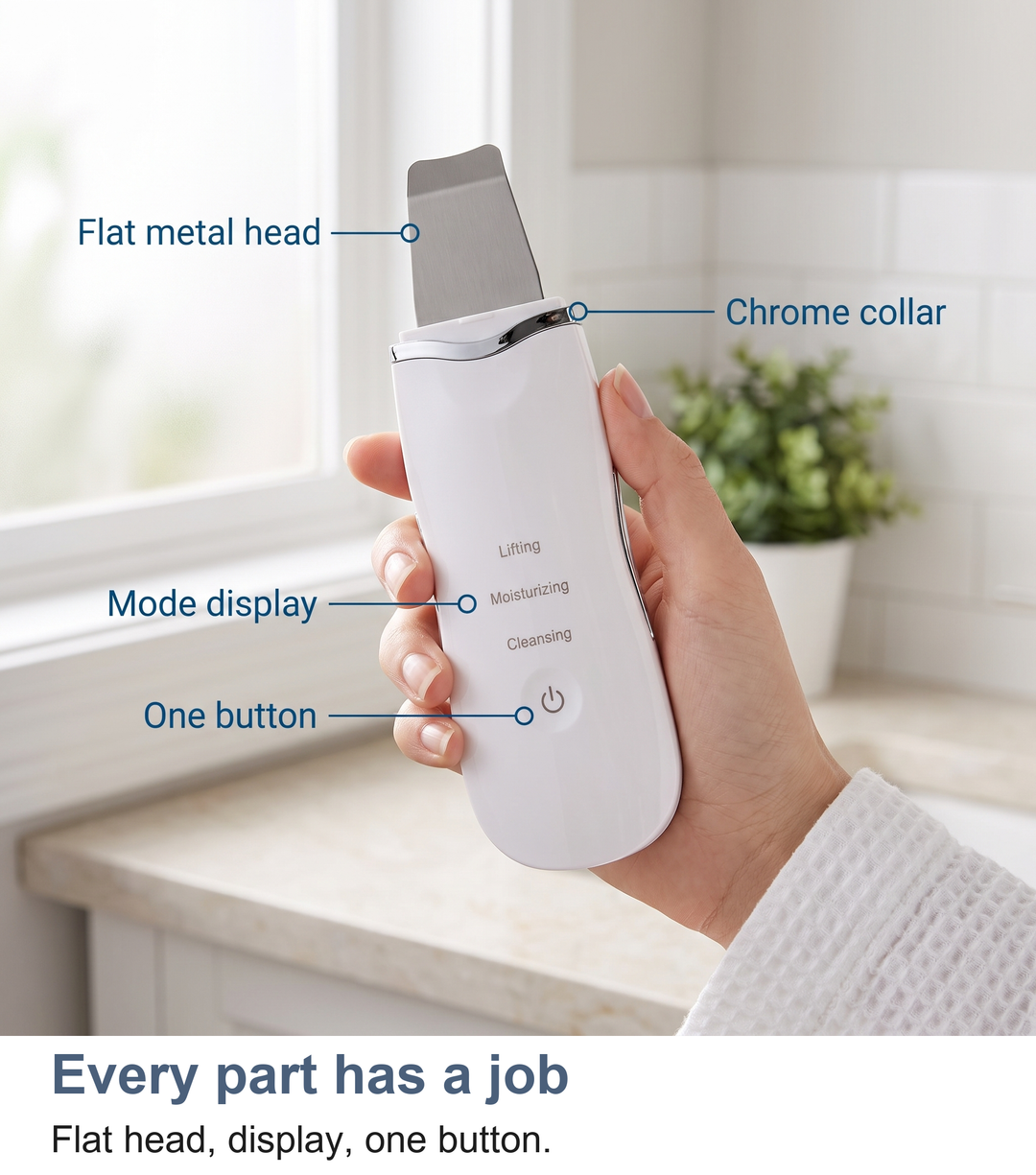 Labelled view of the ultrasonic skin scrubber showing the flat metal head, chrome collar, mode display and one button