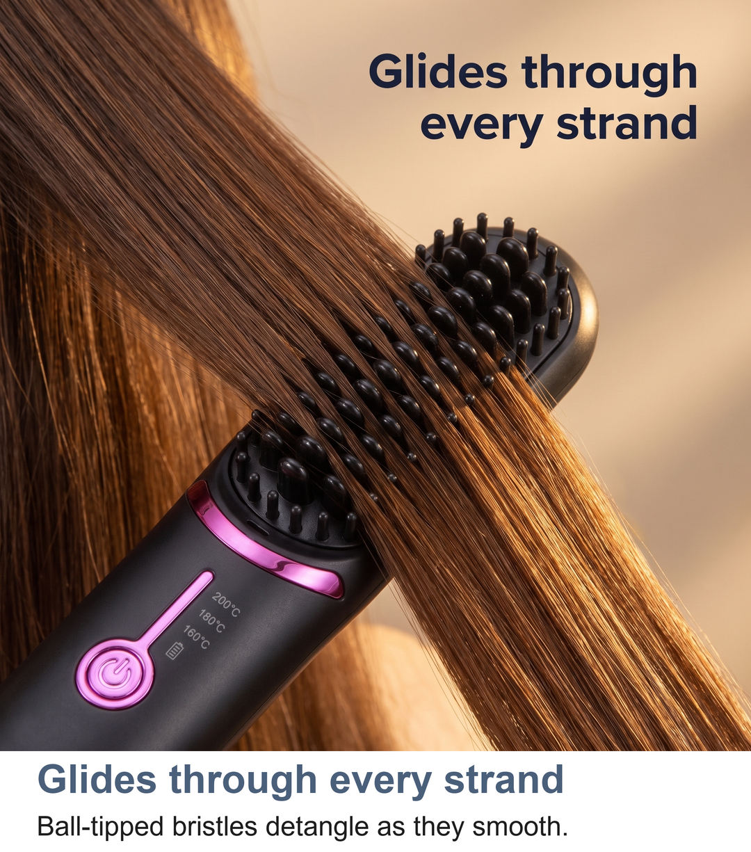 Macro of the ball-tipped bristles of the heated straightening brush gliding through hair