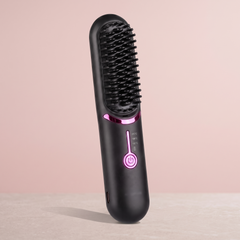 Black cordless heated straightening brush