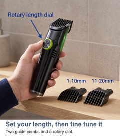 Hand setting the rotary dial on the vacuum hair clipper with its two guide combs